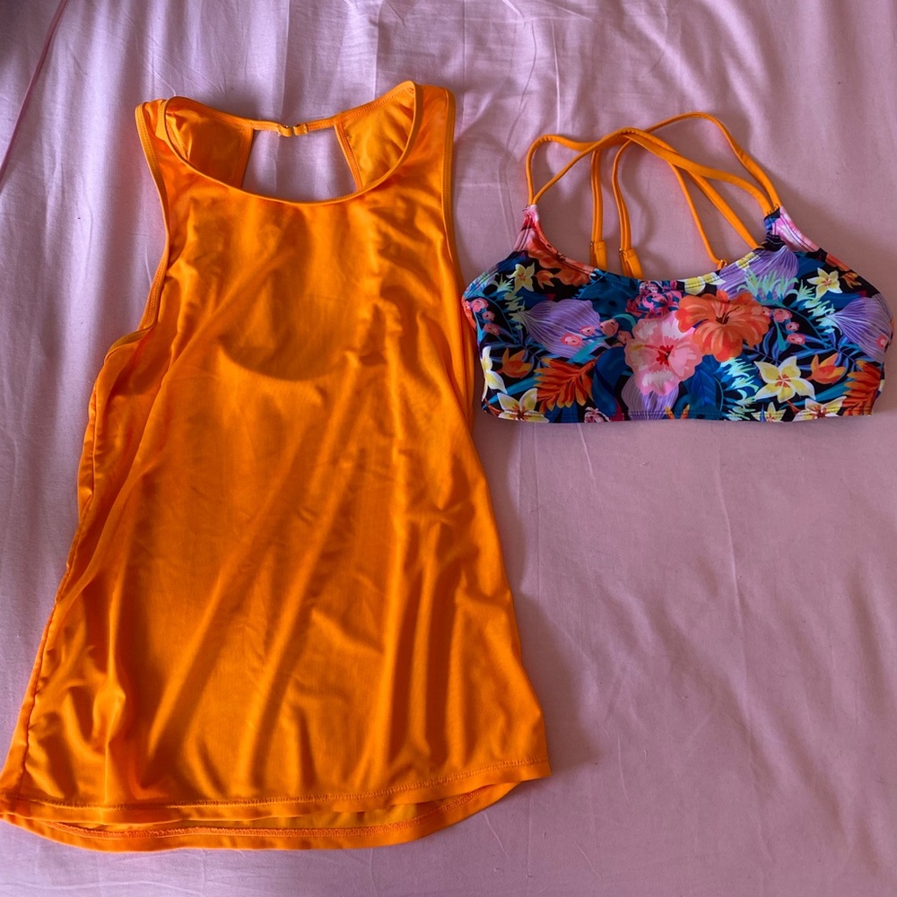Women’s set of floral and orange swim suit top and tank top cover up